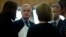 EU chief Brexit negotiator Michel Barnier, second left, talks to other European Commissioners before a weekly meeting at the European Commission headquarters in Brussels, Wednesday, Oct. 10, 2018. 