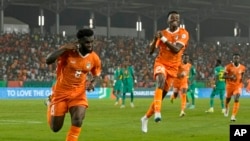 Ivory Coast's Franck Kessie celebrates after scoring a penalty in the 2023 Africa Cup of Nations Round of 16 match against Senegal, at the Charles Konan Banny stadium in Yamoussoukro, Ivory Coast, January 29, 2024.