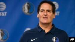 NBA's Dallas Mavericks owner Mark Cuban stands on stage ahead of a news conference, in Dallas, Texas, Feb. 26, 2018.