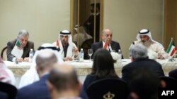 UAE minister of energy & industry Suhail al- Mazrouei (2nd-L) speaks during a joint press conference at the end of the Organization of Arab Petroleum Exporting Countries (OAPEC) meeting in Kuwait City, Dec. 23, 2018. 