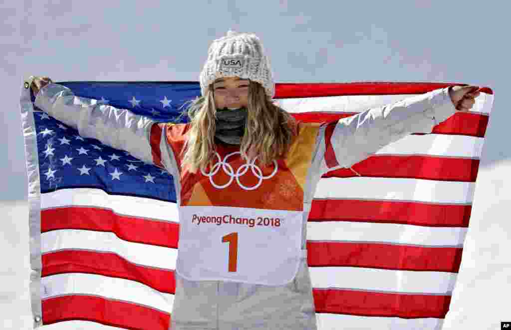 Chloe Kim, of the United States, celebrates winning gold in the women's halfpipe finals at Phoenix Snow Park at the 2018 Winter Olympics in Pyeongchang, South Korea, Feb. 13, 2018.