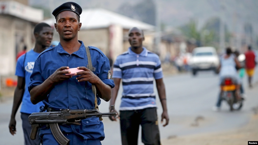 FILE - Burundi police patrol the streets in the capital Bujumbura after the results of the presidential elections were released, July 24, 2015.
