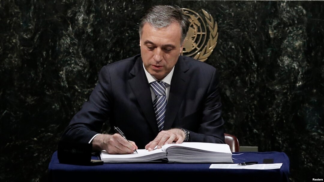 Montenegro President Filip Vujanovic signs the Paris Agreement on climate change at the United Nations Headquarters in New York, April 22, 2016.