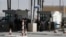 Israeli security forces gather at the the Qalandia checkpoint crossing between the West Bank city of Ramallah and Israeli-annexed East Jerusalem, Nov. 22, 2016. 