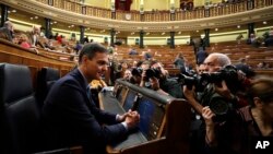 Spain's Prime Minister Pedro Sanchez is photographed at the Spanish parliament in Madrid, Feb. 13, 2019. 