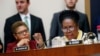 FILE - Representative Sheila Jackson Lee, right, speaks about reparations for the descendants of slaves before the House Judiciary Subcommittee on the Constitution, Civil Rights and Civil Liberties, in Washington, June 19, 2019. Her family posted on Friday that she has died.