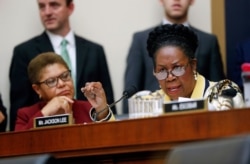 FILE - Rep. Sheila Jackson Lee, D-Texas, right, speaks during a House Judiciary subcommittee meeting, at the Capitol in Washington, June 19, 2019. Looking on is Rep. Karen Bass, D-Calif.