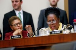 Rep. Sheila Jackson Lee, D-Texas, right, speaks during a hearing about reparation for the descendants of slaves before the House Judiciary Subcommittee on the Constitution, Civil Rights and Civil Liberties, at the Capitol on June 19, 2019.