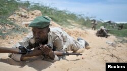 Soldiers from the Somali National Army (SNA) participate in a training exercise in Mogadishu March 28, 2013 in this picture provided by the AU/UN Information Support Team.