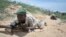 Soldiers from the Somali National Army (SNA) participate in a training exercise in Mogadishu March 28, 2013 in this picture provided by the AU/UN Information Support Team.