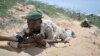 FILE - Soldiers from the Somali army train in Mogadishu, March 28, 2013.