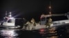 FILE - Sailors recover a high-altitude surveillance balloon off the coast of Myrtle Beach, South Carolina, U.S., Feb. 5, 2023. 