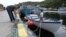 Fisherman Ron Bidgood, helps tie up and secure boats in Petty Harbour-Maddox Cove as Hurricane Larry approaches Newfoundland, Canada on Sept. 10, 2021.