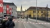 People look into a cordoned off area where a 23-year-old man stabbed several people in the southern Austria city of Villach, Feb. 15, 2025. (Wiesflecker/Kleine Zeitung via AP)