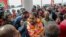 FILE - Maldives opposition leader Qasim Ibrahim, center, is welcomed at the airport as he returned home from exile in Male, Maldives, Thursday, Oct. 4, 2018.