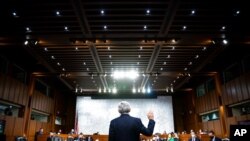 Judge Merrick Garland, nominee to be Attorney General, is sworn in at his confirmation hearing before the Senate Judiciary Committee, on Capitol Hill in Washington, Feb. 22, 2021.