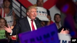 FILE - Republican presidential candidate Donald Trump speaks during a campaign rally at Germain Arena in Ft. Myers, Florida, Sept. 19, 2016.