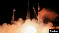 The Soyuz TMA-15M spacecraft carrying the International Space Station crew of Anton Shkaplerov of Russia, Terry Virts of the U.S. and Samantha Cristoforetti of Italy blasts off from the launch pad at the Baikonur cosmodrome, November 24, 2014.