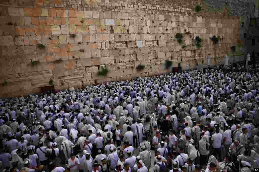 Jewish men during &quot;Jerusalem Day,&quot; an Israeli holiday celebrating the capture of the Old City during the 1967 Mideast war, at the Western Wall, the holiest site where Jews can pray in the Old City of Jerusalem.