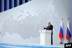 Presiden Rusia Vladimir Putin menyampaikan pidato kenegaraan tahunannya di pusat kota Moskow pada 29 Februari 2024. (Foto: AFP)