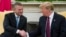 President Donald Trump shakes hands with Slovak Prime Minister Peter Pellegrini during a meeting in the Oval Office of the White House, May 3, 2019, in Washington.