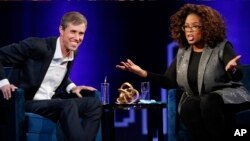 Former Democratic Texas congressman Beto O'Rourke, left, appears with Oprah Winfrey for "Oprah's SuperSoul Conversations from Times Square," Feb. 5, 2019, in New York.