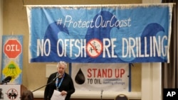 FILE - Crystal Dingler, mayor of Ocean Shores, Wash., speaks March 5, 2018, at a hearing in Olympia, Wash., organized by environmental groups opposed to the Trump administration's proposal to expand offshore oil drilling off the Pacific Northwest coast.