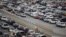  Cars wait to cross at San Ysidro border crossing between the U.S. and Mexico, in Tijuana, Mexico, May 6, 2019. An American man was arrested in a car chase to the crossing that left several people injured.