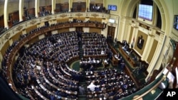 FILE - Members of Egypt's Parliament attend the inaugural session in Cairo, Jan. 10, 2016. 