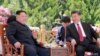 North Korean leader Kim Jong Un meets with China's President Xi Jinping, in Dalian, China in this undated photo released on May 9, 2018 by North Korea's Korean Central News Agency (KCNA).