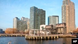 FILE - Long Island City, Queens, N.Y., along the East River is seen Feb. 14, 2019. The area was the proposed site for a new Amazon headquarters until the company announced it would abandon the project.