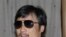 Chen Guangcheng rafiqasi bilan Vashingtonda. 2012-yil 19-may. 