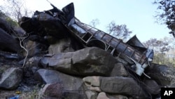 The wreckage off a bus lays in a ravine a day after it plunged off a bridge on the Mmamatlakala mountain pass between Mokopane and Marken, around 300kilometers north of Johannesburg, on March 29, 2024.