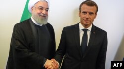 Emmanuel Macron, à droite, et son homologue iranien Hassan Rohani, en marge de l'Assemblée Générale de l'ONU, New York, le 25 septembre 2018.