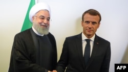 Emmanuel Macron, à droite, et Hassan Rohani, en marge de l'Assemblée générale de l'ONU, New York, le 25 septembre 2018. 