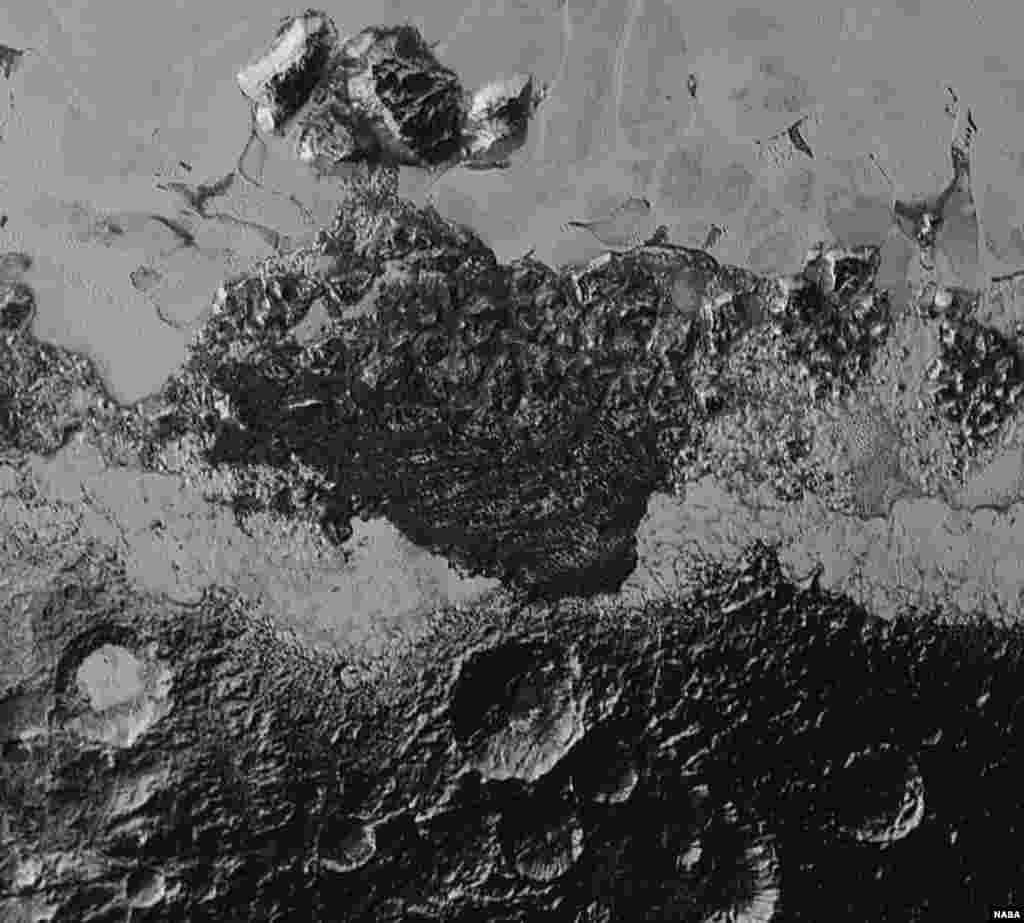 This 220-mile (350-kilometer) wide view of Pluto from NASA’s New Horizons spacecraft illustrates the incredible diversity of surface reflectivities and geological landforms on the dwarf planet. The image includes dark, ancient heavily cratered terrain; br