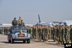 Upacara pembukaan latihan militer gabungan Super Garuda Shield di Sidoarjo, Jawa Timur, 26 Agustus 2024. (Foto: JUNI KRISWANTO/AFP)