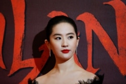 Cast member Liu Yifei poses at the European premiere for the film "Mulan" in London, March 12, 2020.