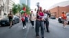 Alia Amanpour Trapp, center, leads the crowd during a pro-Palestine rally and march on Temple University campus in Philadelphia, Pennsylvania, Aug. 29, 2024. 