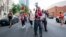 Alia Amanpour Trapp, center, leads the crowd during a pro-Palestine rally and march on Temple University campus in Philadelphia, Pennsylvania, Aug. 29, 2024. 