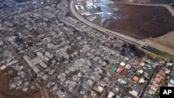 La destrucción causada por los incendios en Lahaina, Hawái, se observa en esta foto aérea del 10 de agosto de 2023.