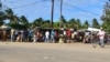 FILE - Residents visit a market in Macomia, northern Mozambique, June 11, 2018. Some experts believe IS has already set its sights on Mozambique, particularly its northern region because of the economic disparity that, in part, allows radical Islamist ide