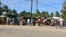 FILE - Residents visit a market in Macomia, northern Mozambique, June 11, 2018. Some experts believe IS has already set its sights on Mozambique, particularly its northern region because of the economic disparity that, in part, allows radical Islamist ide