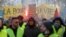 FILE - Protesters wearing yellow vests take part in a demonstration of the "yellow vests" movement in Marseille, France, Jan. 26, 2019.
