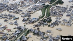 Une zone inondée est observée après de fortes pluies à Kurashiki, préfecture d'Okayama, au Japon, le 8 juillet 2018.