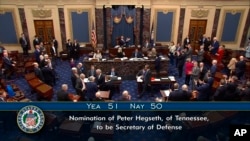 The vote total is shown after Vice President JD Vance casts the tie-breaking vote to confirm Pete Hegseth as President Donald Trump's defense secretary on Jan. 24, 2025, at the Capitol in Washington. (Senate Television via AP)