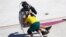 Kieran Woolley of Australia crashes into a cameraman&nbsp;in the men's park skateboarding preliminary round at the 2020 Summer Olympics in Tokyo, Japan.