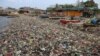 Plastic waste is seen choking Sukaraja beach in Bandar Lampung, Indonesia.