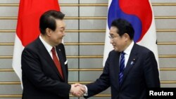 韩国总统尹锡悦2023年3月16日访日首日与首相岸田文雄举行会谈。（路透社）