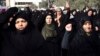 Iranian protesters chant slogans at a rally in Tehran, Iran, Dec. 30, 2017. Iranian hard-liners rallied Saturday to support the country's supreme leader and clerically overseen government as spontaneous protests sparked by anger over the country's ailing 